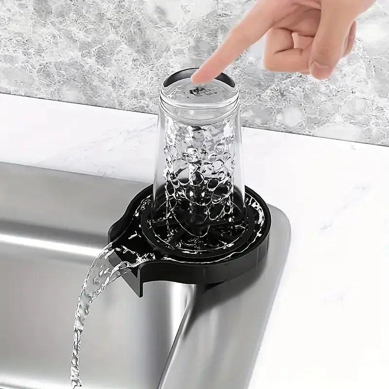 Water jets rinsing the inside of an upturned glass on the High-Pressure Cup Washer